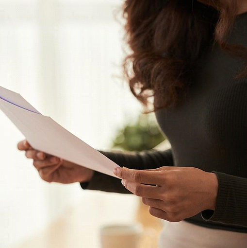 woman reviewing document
