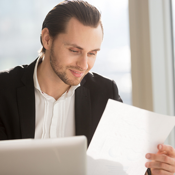 man looking at accounts